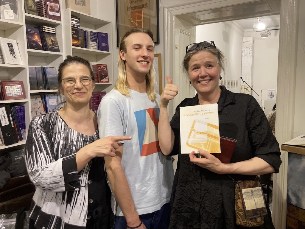 student documentarian with author at book event